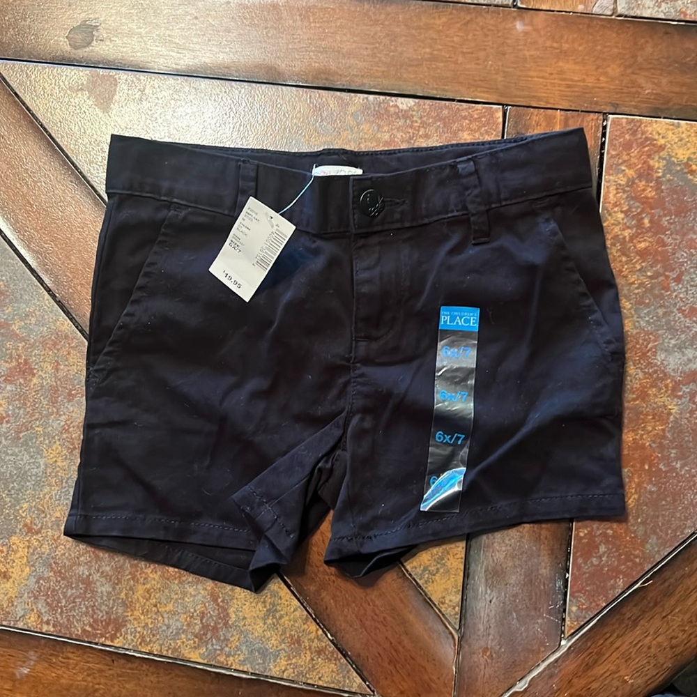 Brand new black shorts, size 6x/7